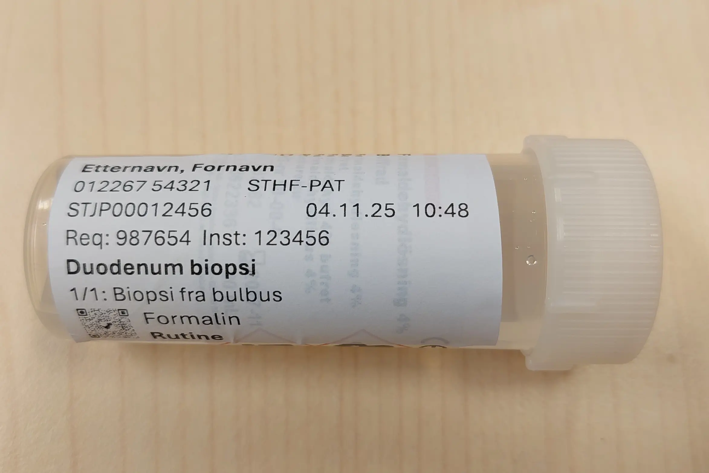 Beholder-etikett til legekontor