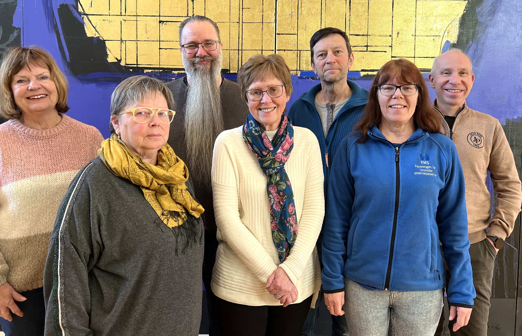 En gruppe mennesker som poserer for et bilde