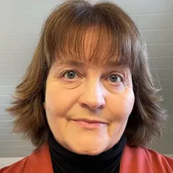 En person med langt hår