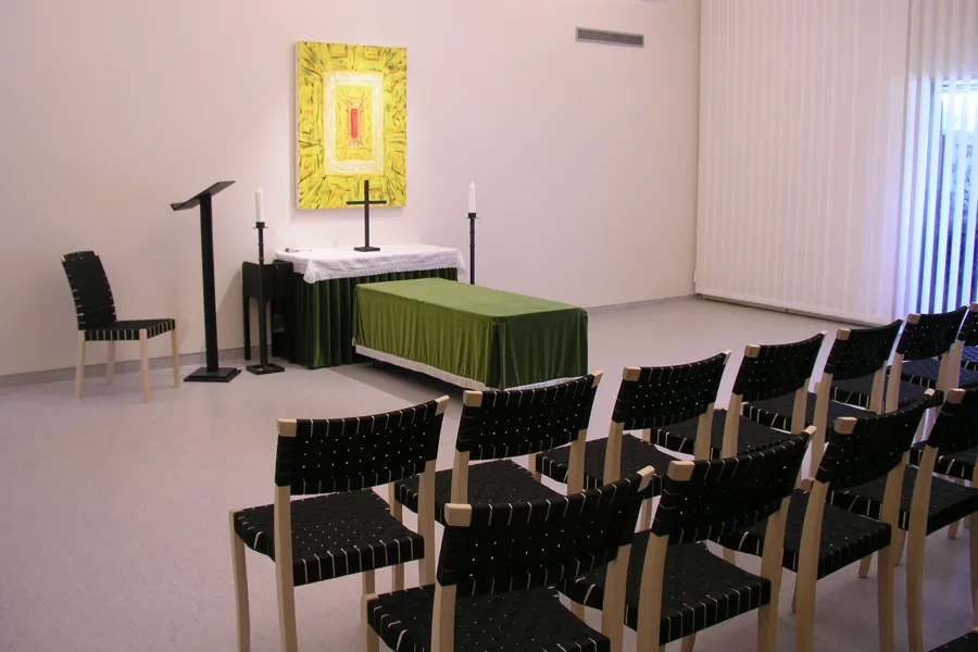 A room with chairs and tables