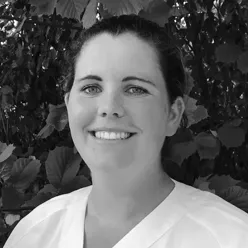 En person som smiler til kameraet